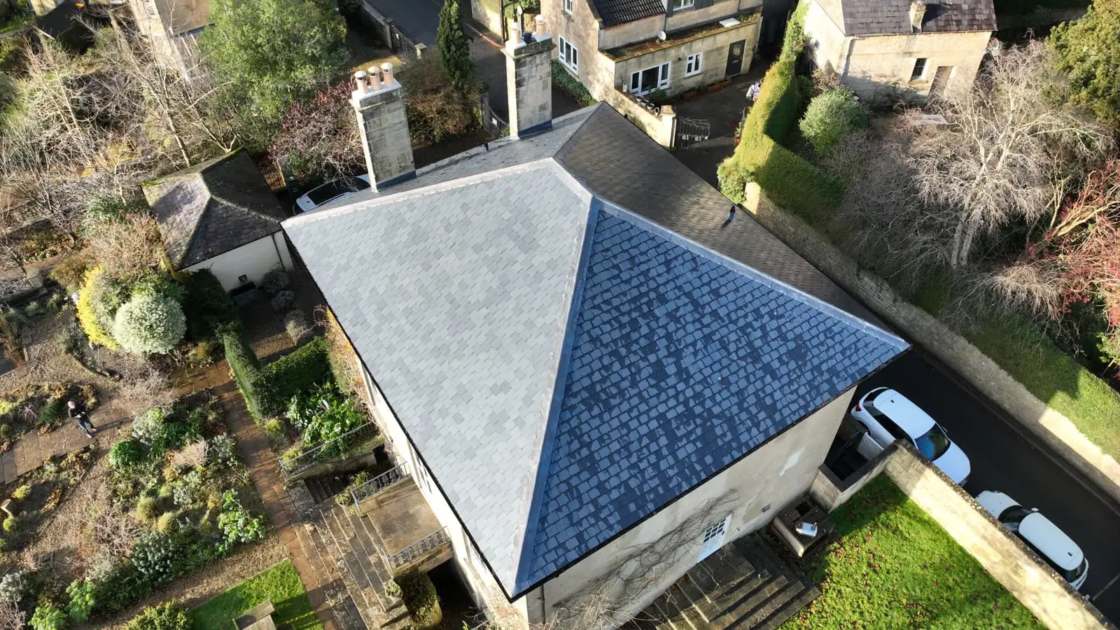 Drone inspection being carried out above a residential property roof
