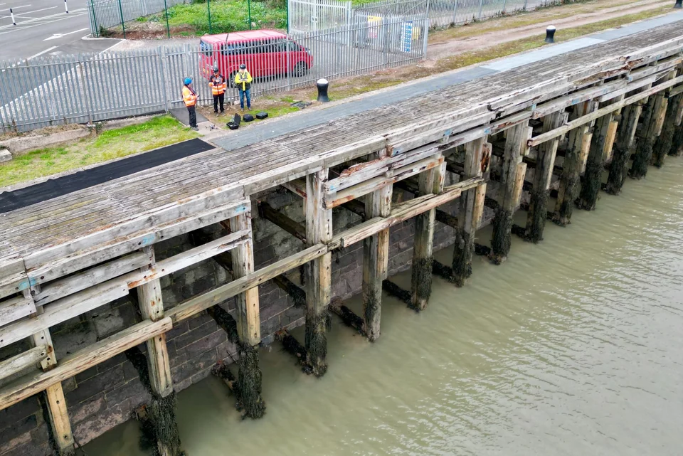 Dock wall, waterside access and supporting timber structures